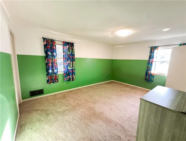 $333,000 | 507 South Washington Street, Raymore, MO 64083