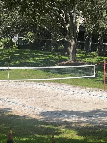 a view of a swimming pool and a yard