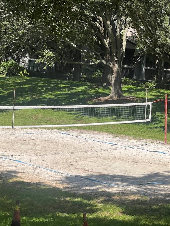 365 Forestway Circle, Unit 307 Altamonte Springs, FL 32701 - Photo 14 of 14 a view of a swimming pool and a yard