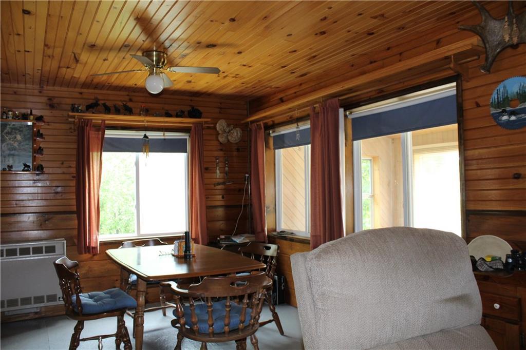 585 Old Spencer Road West Forks, ME 04985 - Photo 9 of 33 Large dining room with lots of...