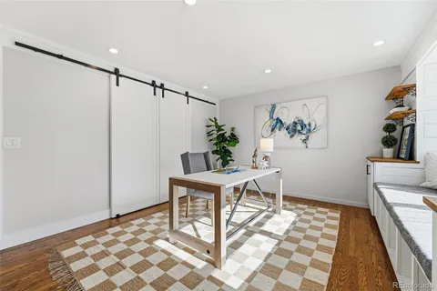 a workspace with furniture and window