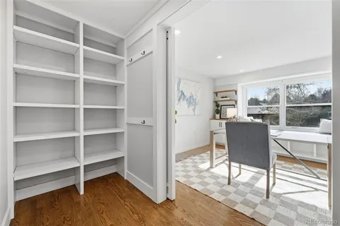 a view of a livingroom with furniture and wooden floor