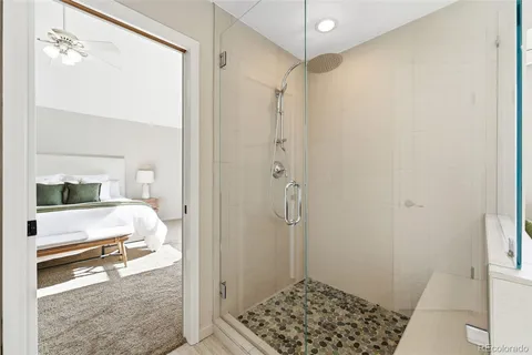 a bathroom with a sink and a shower