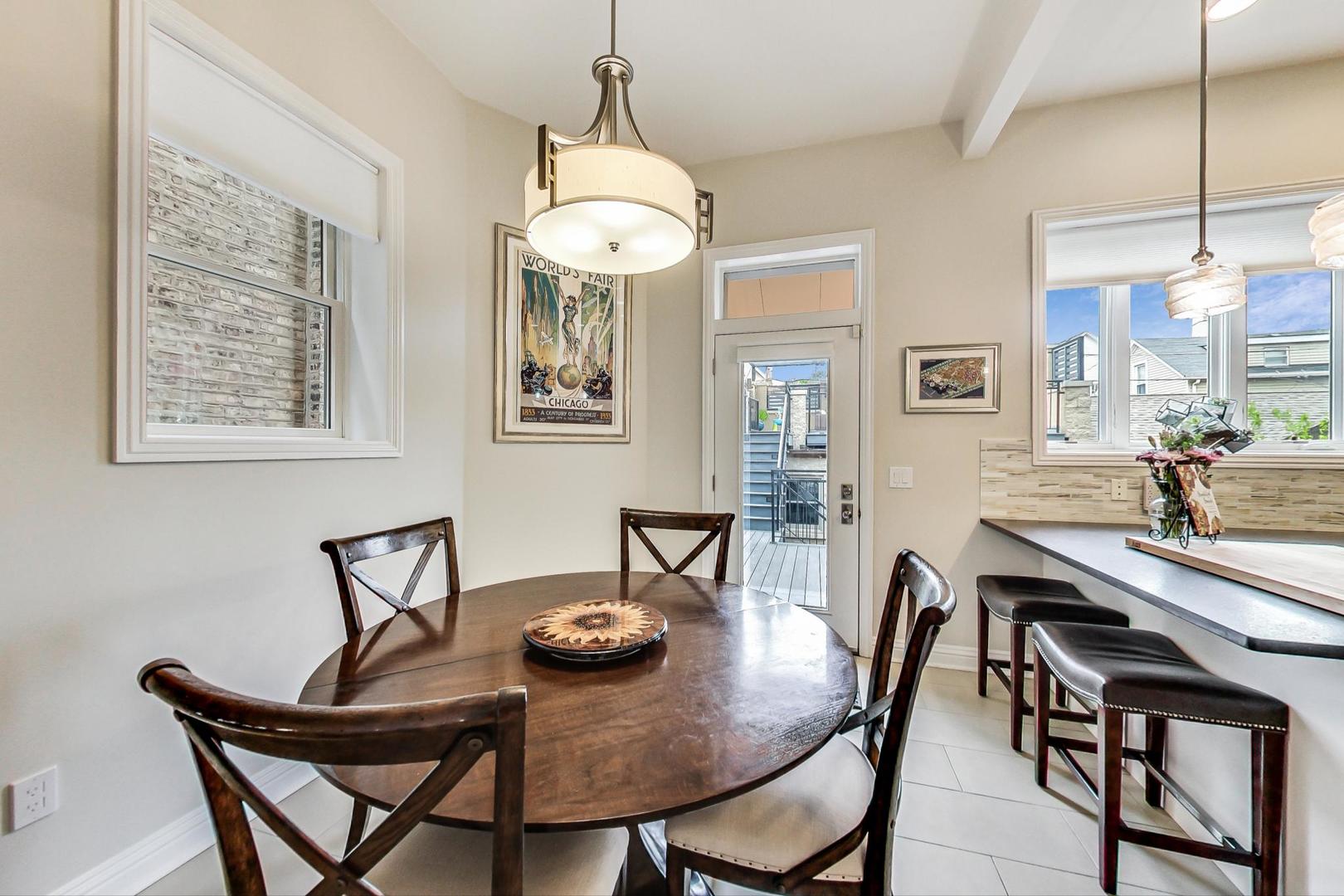 2630 North Racine Avenue Chicago, IL 60614 - Photo 11 of 47 a view of a dining room with furniture