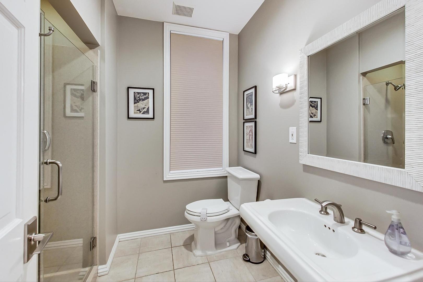 2630 North Racine Avenue Chicago, IL 60614 - Photo 18 of 47 a bathroom with a sink toilet and shower
