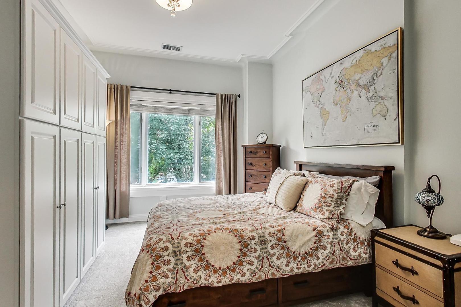 2630 North Racine Avenue Chicago, IL 60614 - Photo 28 of 47 a bedroom with a bed and a window