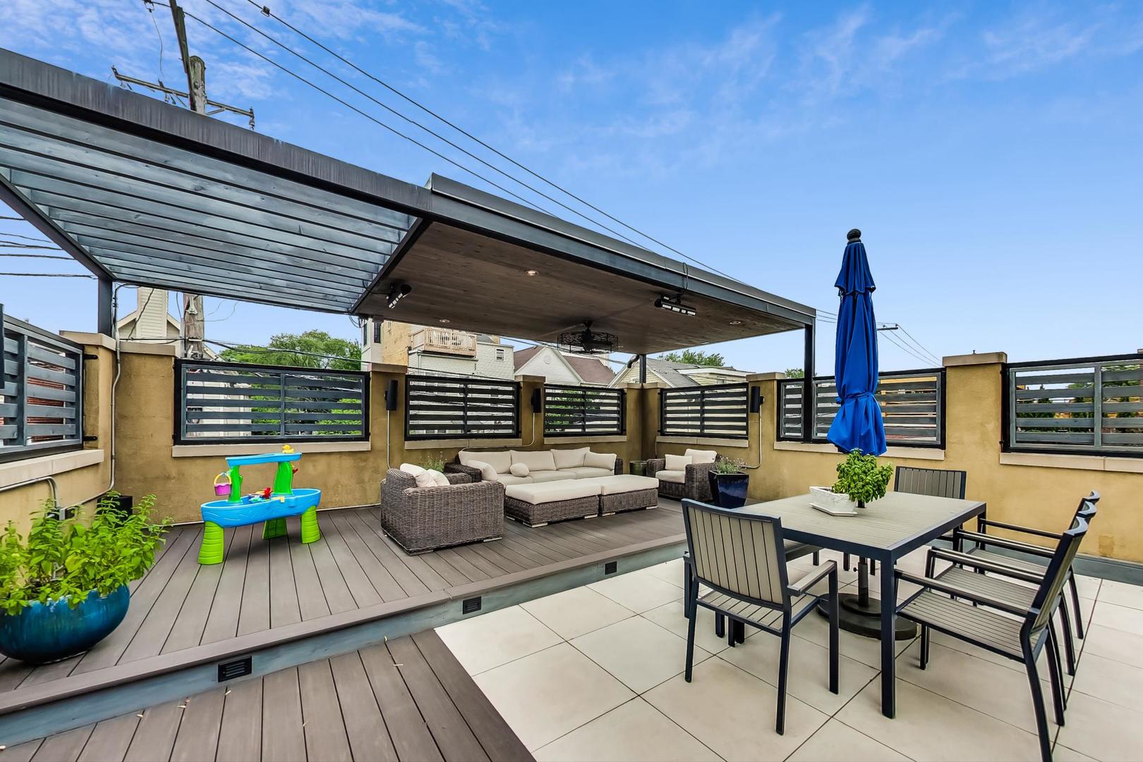 2630 North Racine Avenue Chicago, IL 60614 - Photo 39 of 47 a view of outdoor dining space with a table and chairs