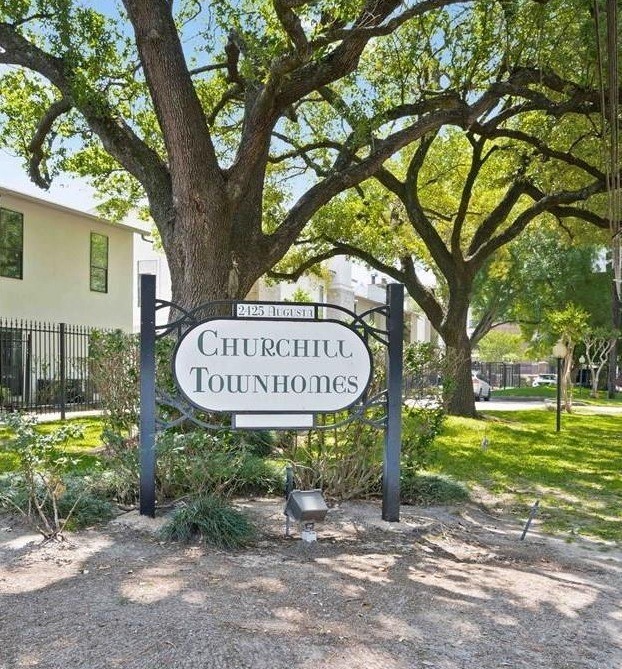 2425 Augusta Drive, Unit 44 Houston, TX 77057 - Photo 16 of 16 a front view of a house with garden