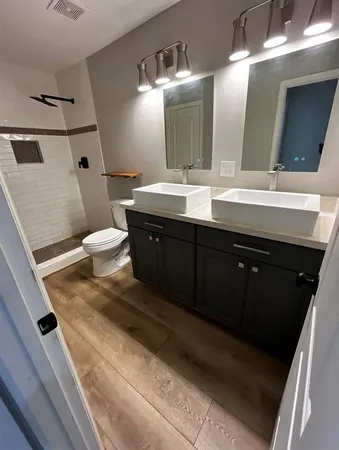 a bathroom with a sink and mirror