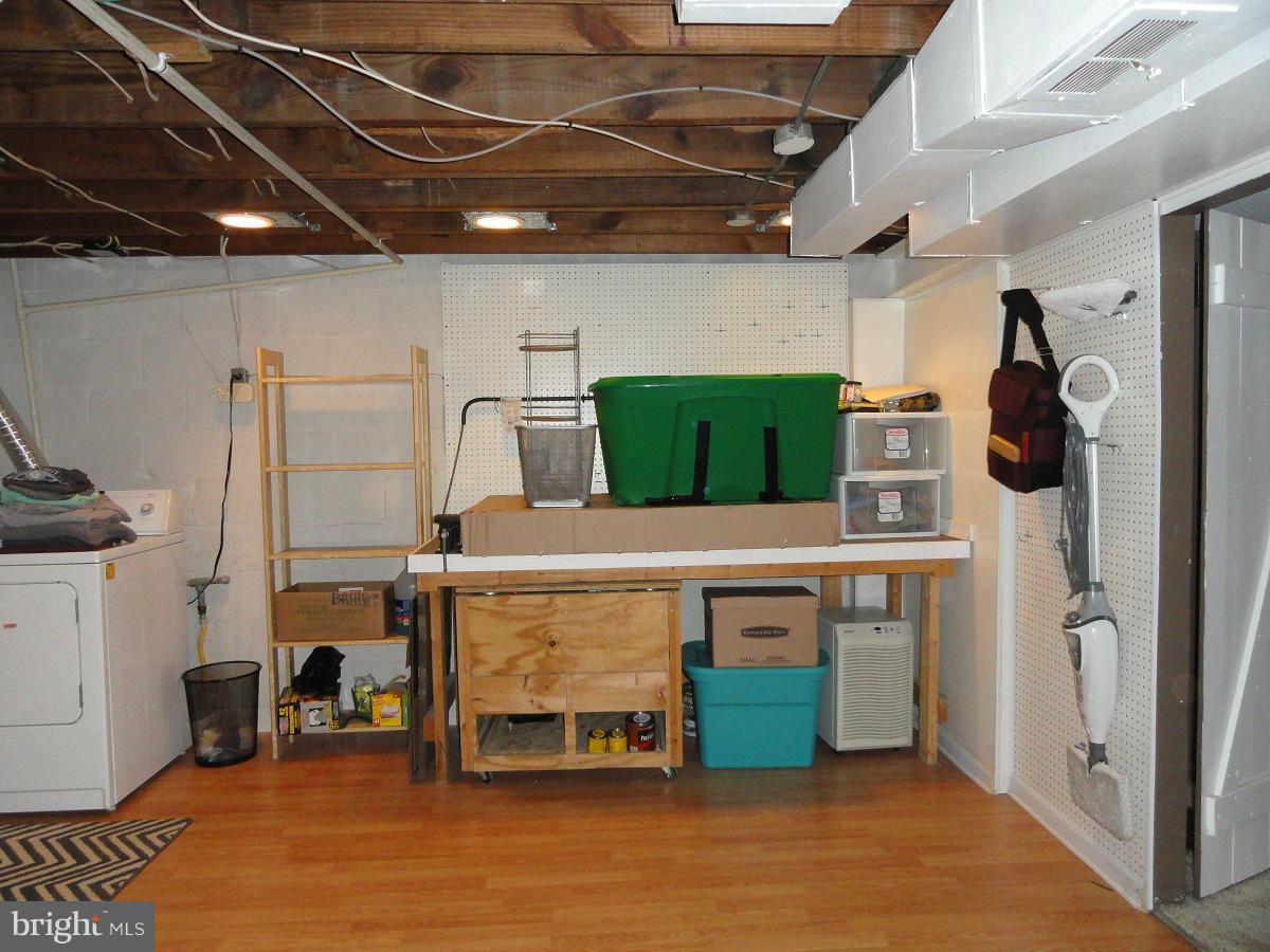 1803 Deveron Road Baltimore, MD 21286 - Photo 20 of 30 View of Utility Area with Workbench. The Home is