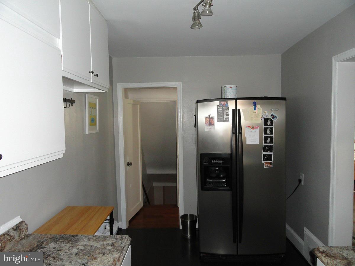 1803 Deveron Road Baltimore, MD 21286 - Photo 9 of 30 Kitchen with Stainless Refrigerator and Doorway
