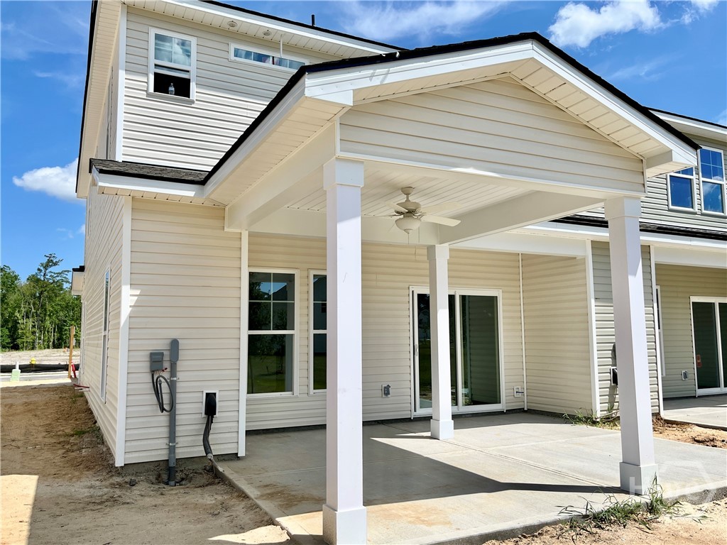 111 Pinebury Road Pooler, GA 31322 - Photo 14 of 22 Photo taken 7.3.26. HOME IS UNDER CONSTRUCTION. Expanded covered porch in back of home plus large concrete area - great for entertaining, relaxing and grilling!