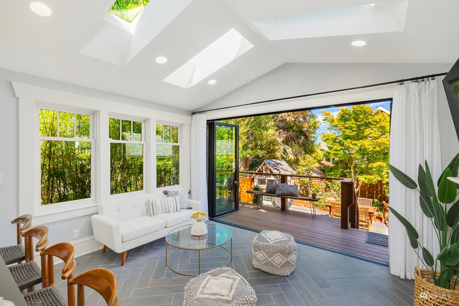 2326 North 59th Street Seattle, WA 98103 - Photo 17 of 38 a living room with furniture and a large window