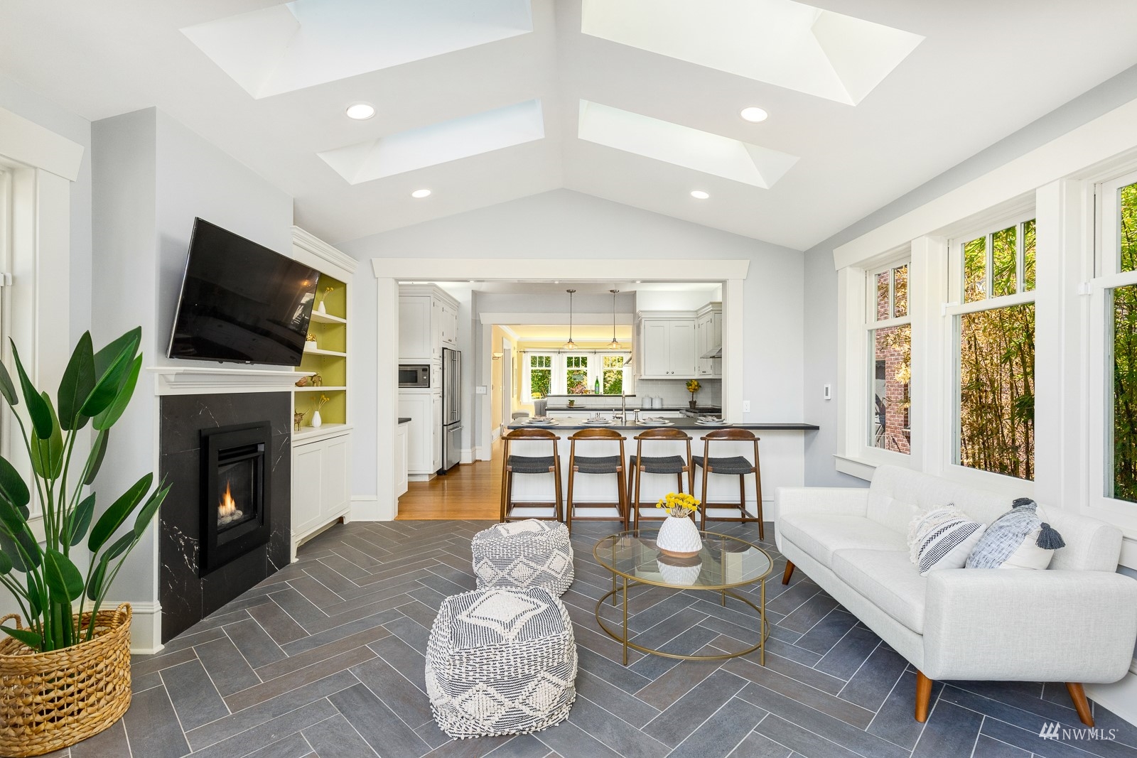 2326 North 59th Street Seattle, WA 98103 - Photo 19 of 38 a living room with furniture fireplace and a flat screen tv