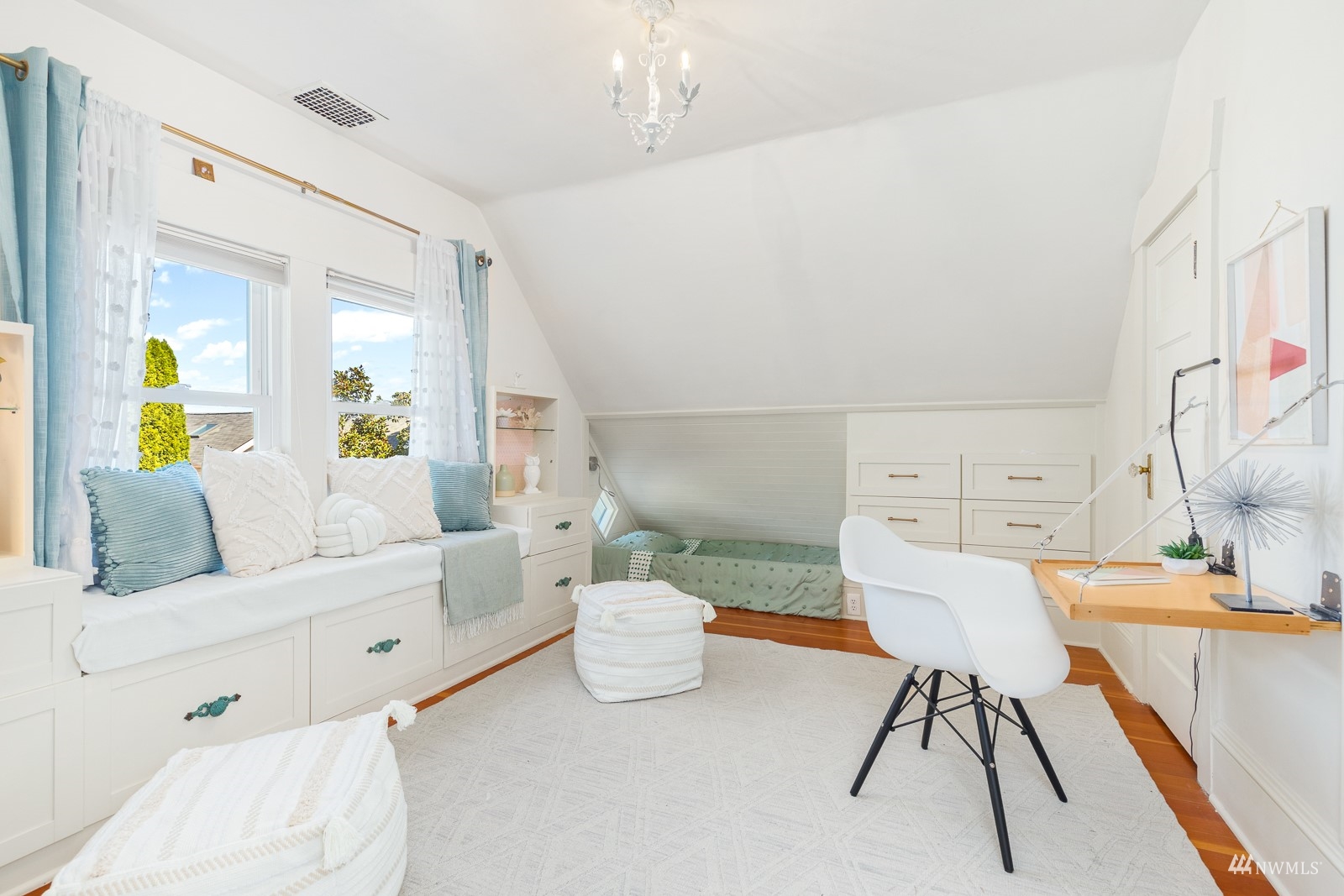 2326 North 59th Street Seattle, WA 98103 - Photo 27 of 38 a living room with furniture and a couch
