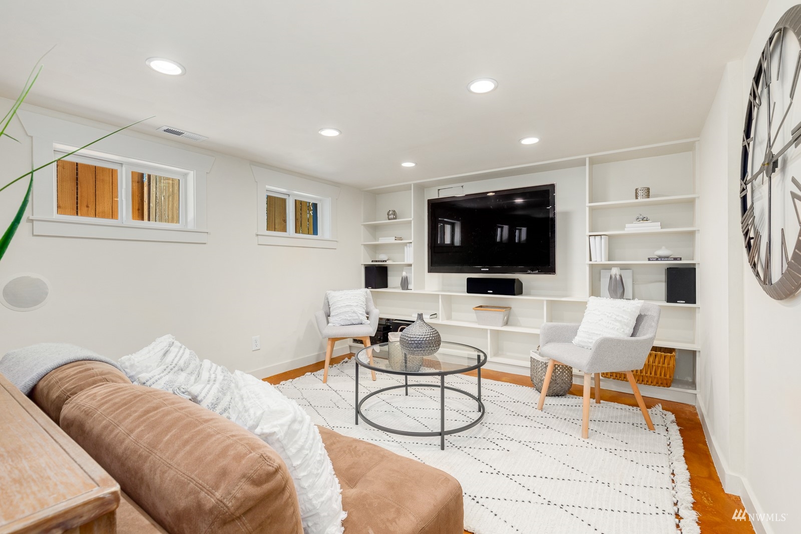 2326 North 59th Street Seattle, WA 98103 - Photo 31 of 38 a living room with furniture and a flat screen tv