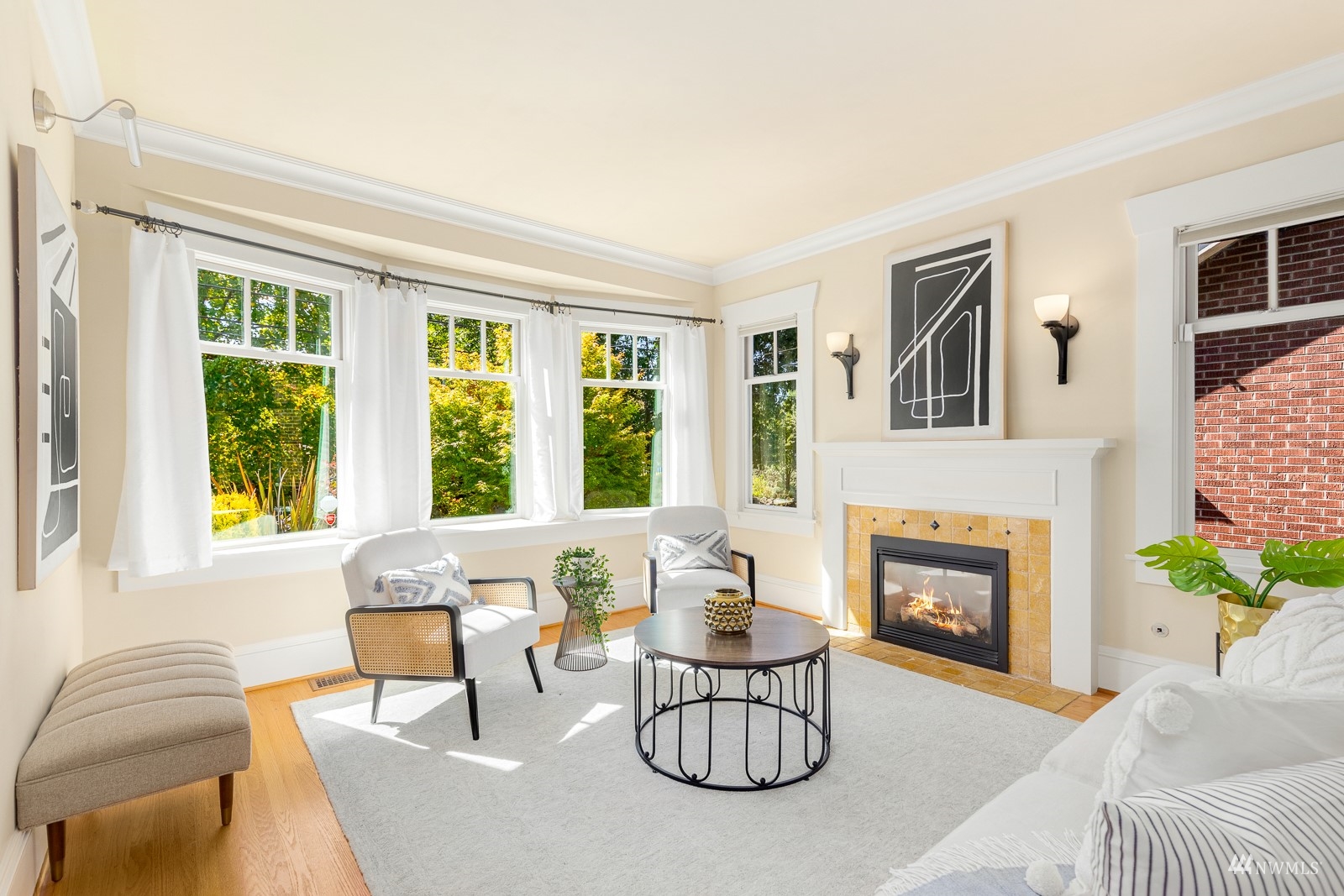 2326 North 59th Street Seattle, WA 98103 - Photo 7 of 38 a living room with furniture and a fireplace