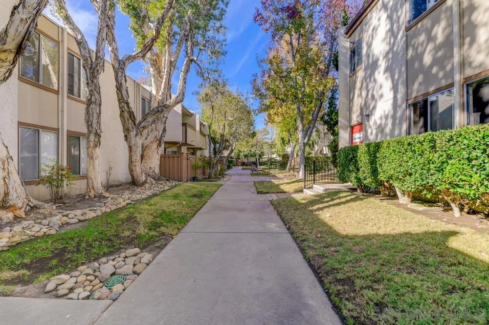 3550 Ruffin Road, Unit 261 San Diego, CA 92123 - Photo 17 of 22 a view of a pathway with a houses