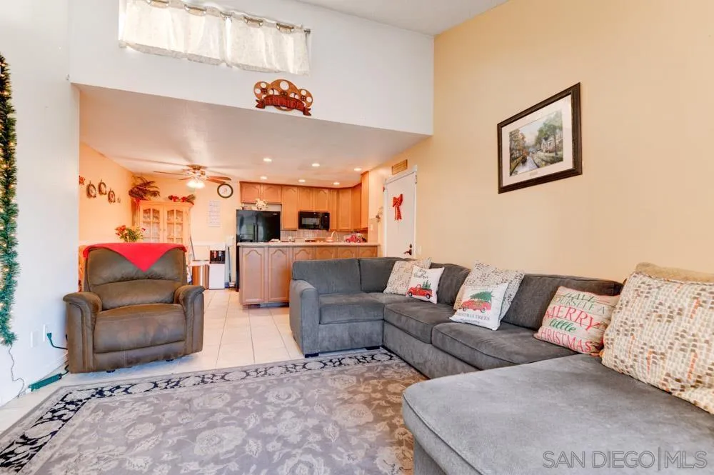 3550 Ruffin Road, Unit 261 San Diego, CA 92123 - Photo 6 of 22 a living room with furniture and a couch