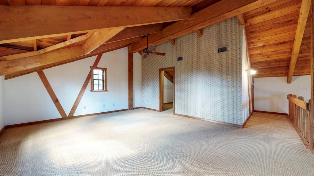 19803 Reading Road Lutz, FL 33558 - Photo 30 of 48 a view of a room with wooden floor and walls