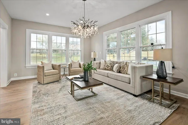 a kitchen with kitchen island a sink appliances and a counter top space