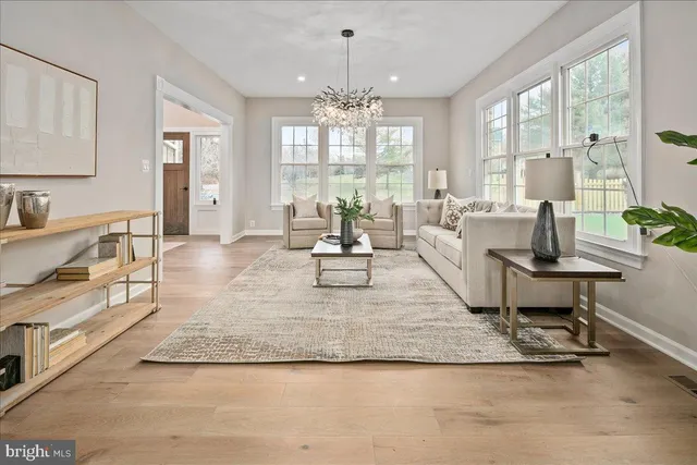a kitchen with kitchen island a sink appliances and a counter top space