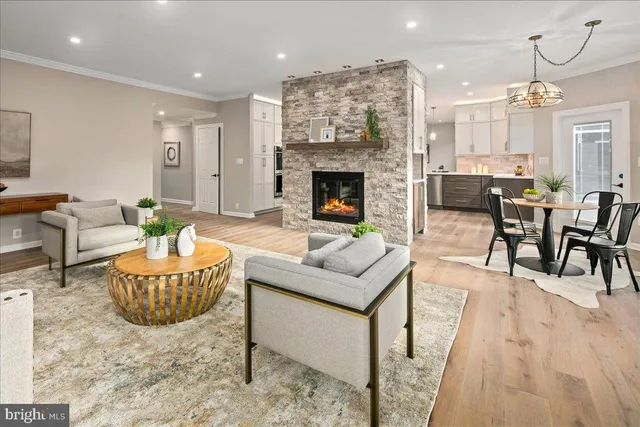 a bathroom with a sink toilet vanity and shower
