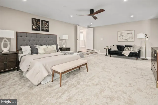 a living room with furniture or couch and a wooden floor