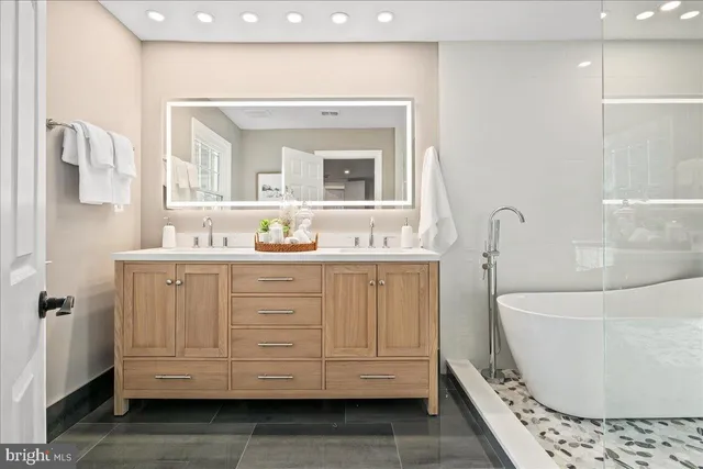 a view of an empty room with a closet and storage