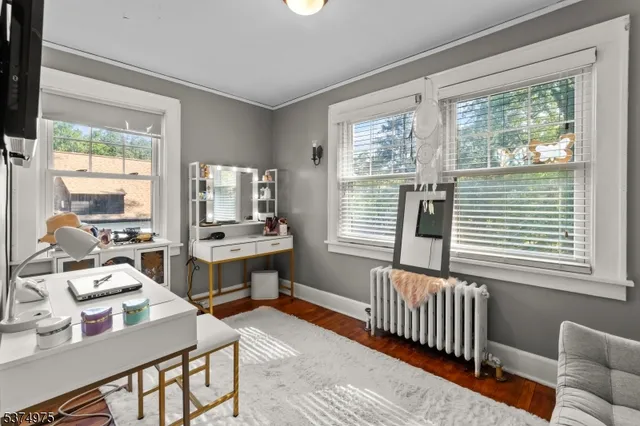 a bedroom with a bed and a table