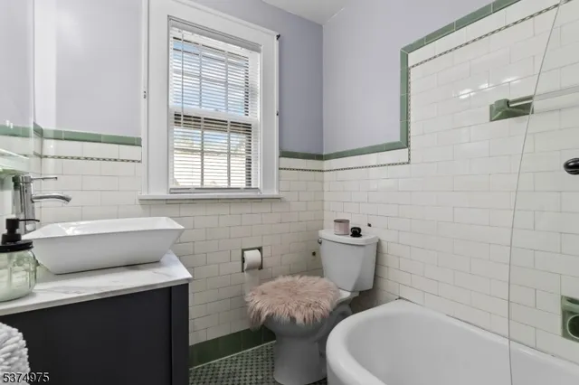 a view of a livingroom with furniture and wooden floor