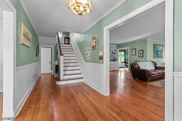 a view of livingroom with furniture and wooden floor