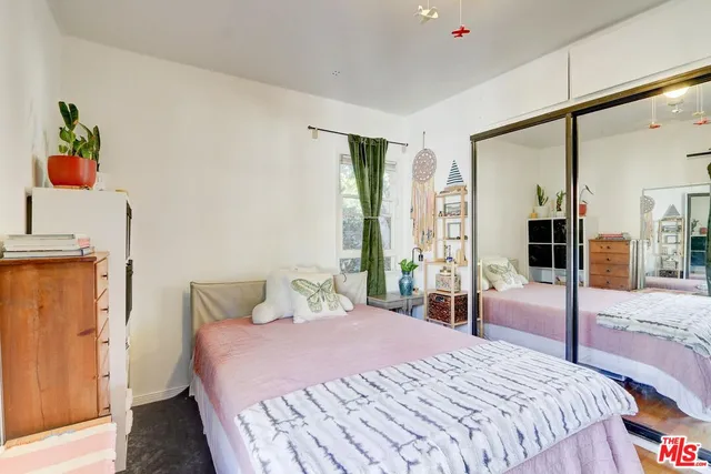 an empty room with white walls