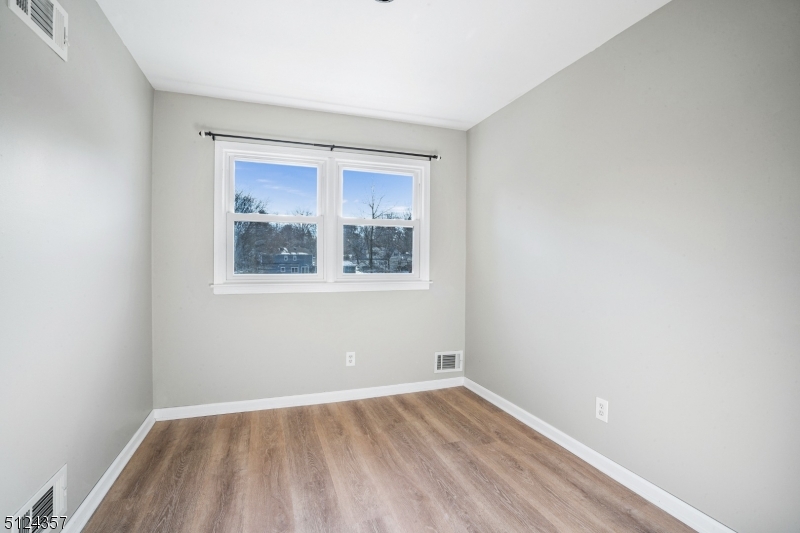 1 Tempe Wick Road, Unit A Mendham, NJ 07945 - Photo 17 of 22 an empty room with a window