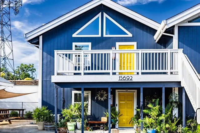 a front view of a house having yard