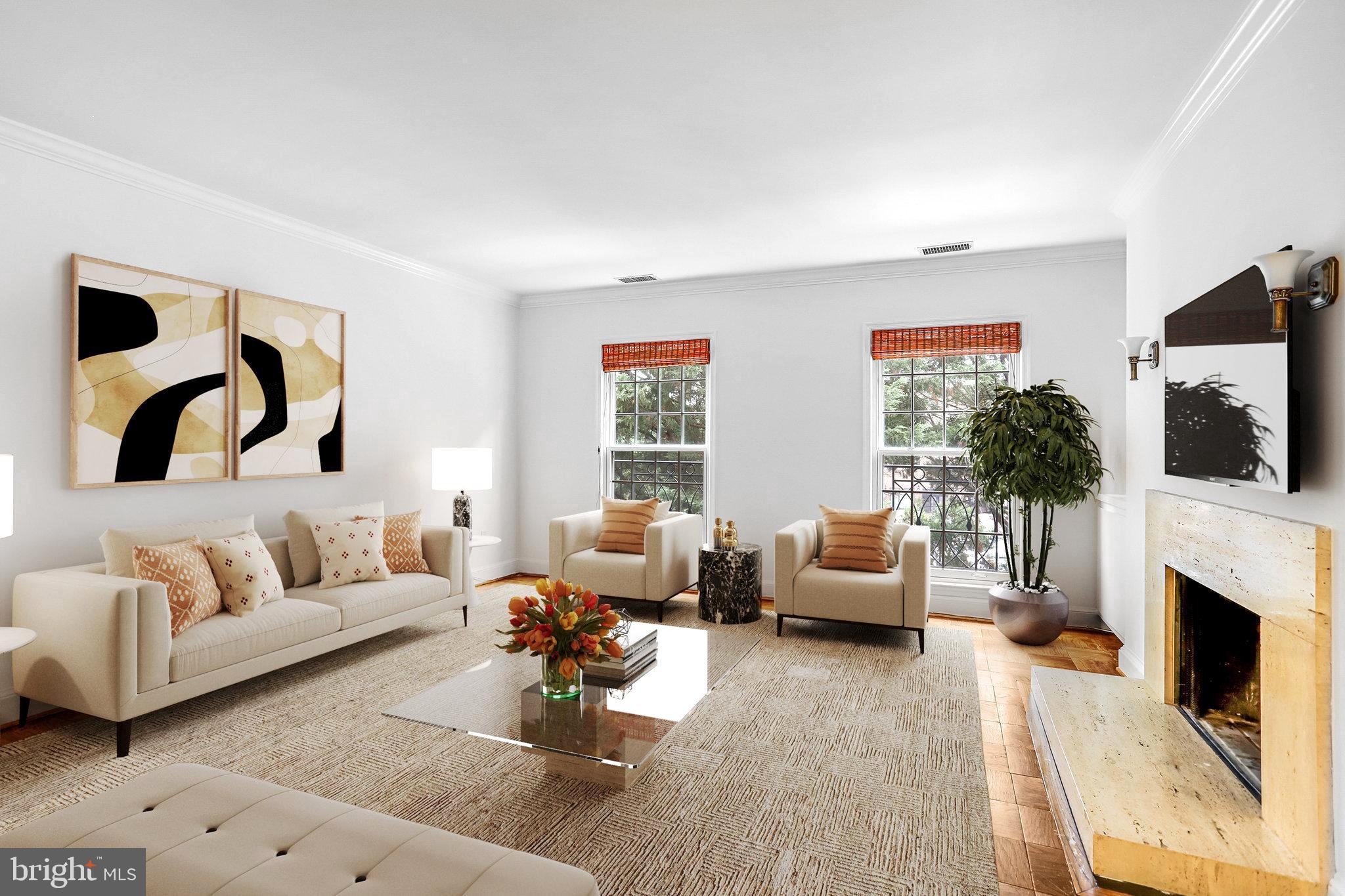 a living room with furniture fireplace and flat screen tv