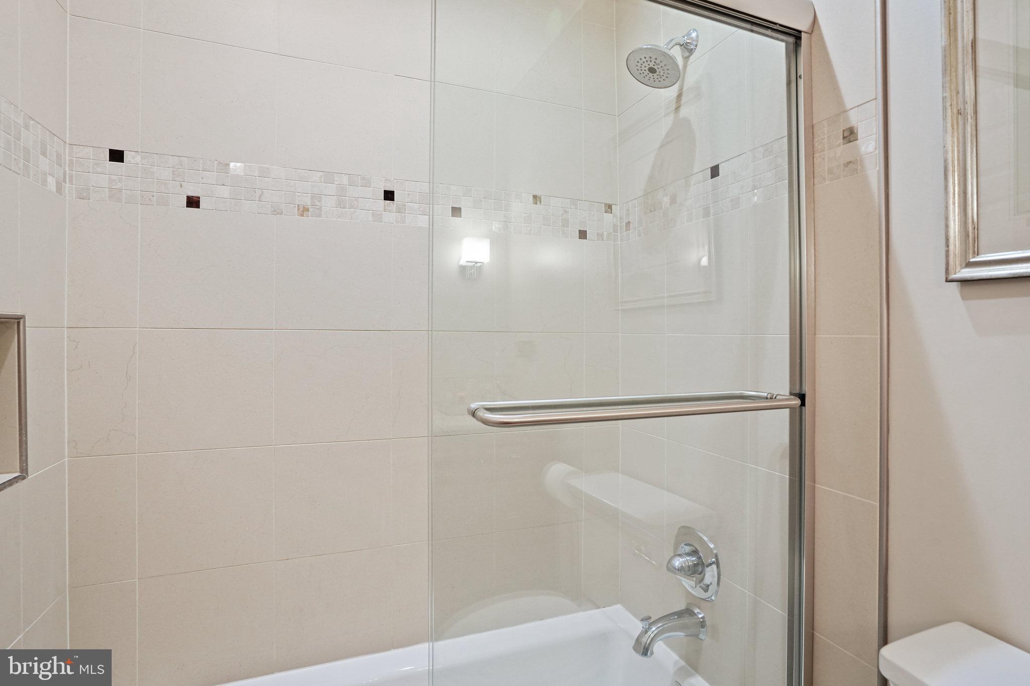 3275 Sutton Place Northwest, Unit A Washington, DC 20016 - Photo 17 of 27 a bathroom with a shower