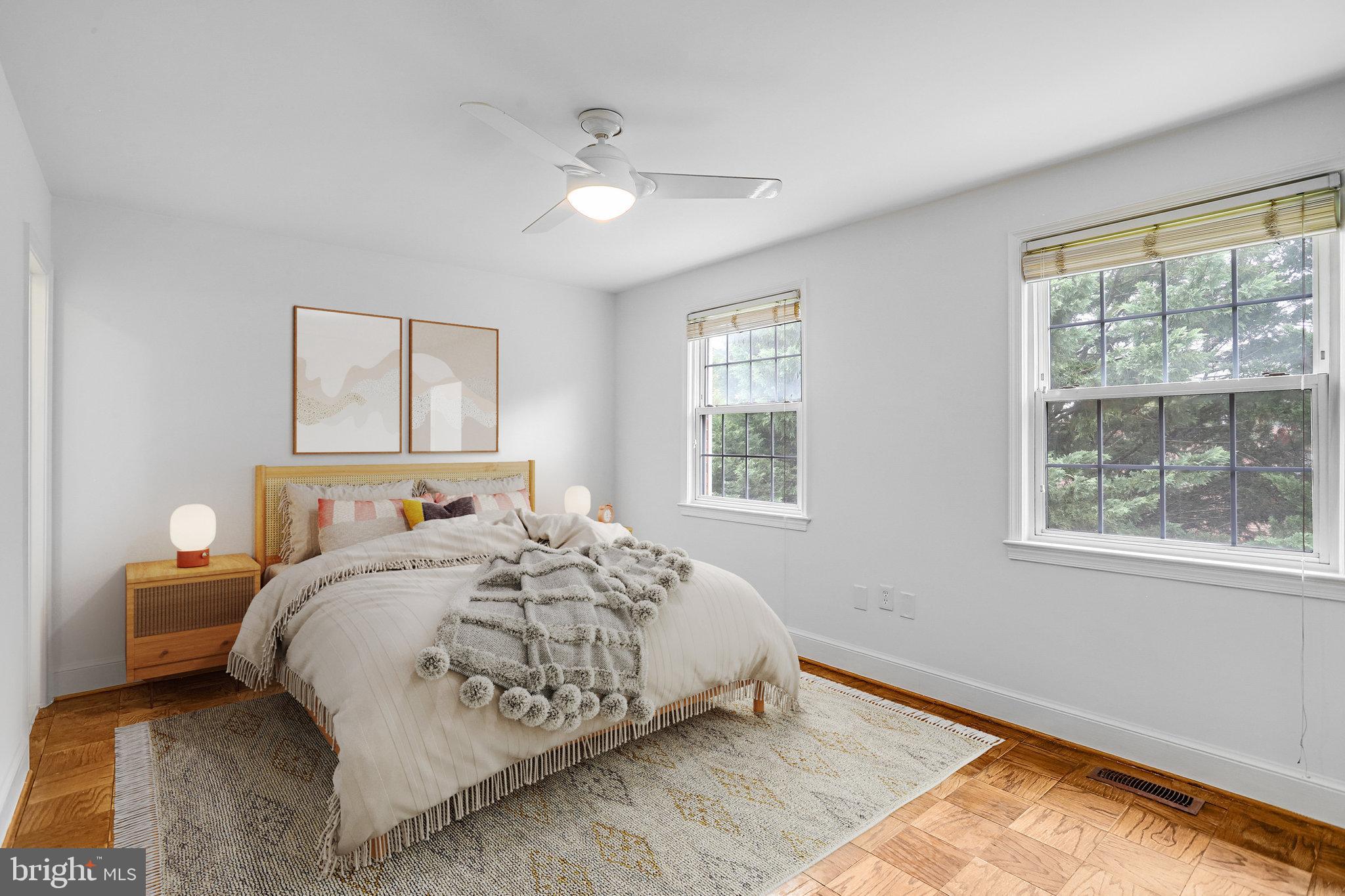 3275 Sutton Place Northwest, Unit A Washington, DC 20016 - Photo 20 of 27 a bedroom with a bed and a window