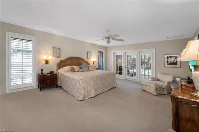 a view of an entryway with wooden floor and windows