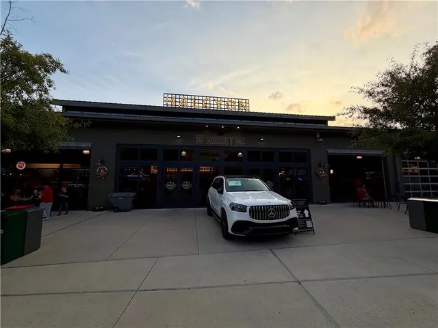 a car parked in front of a building