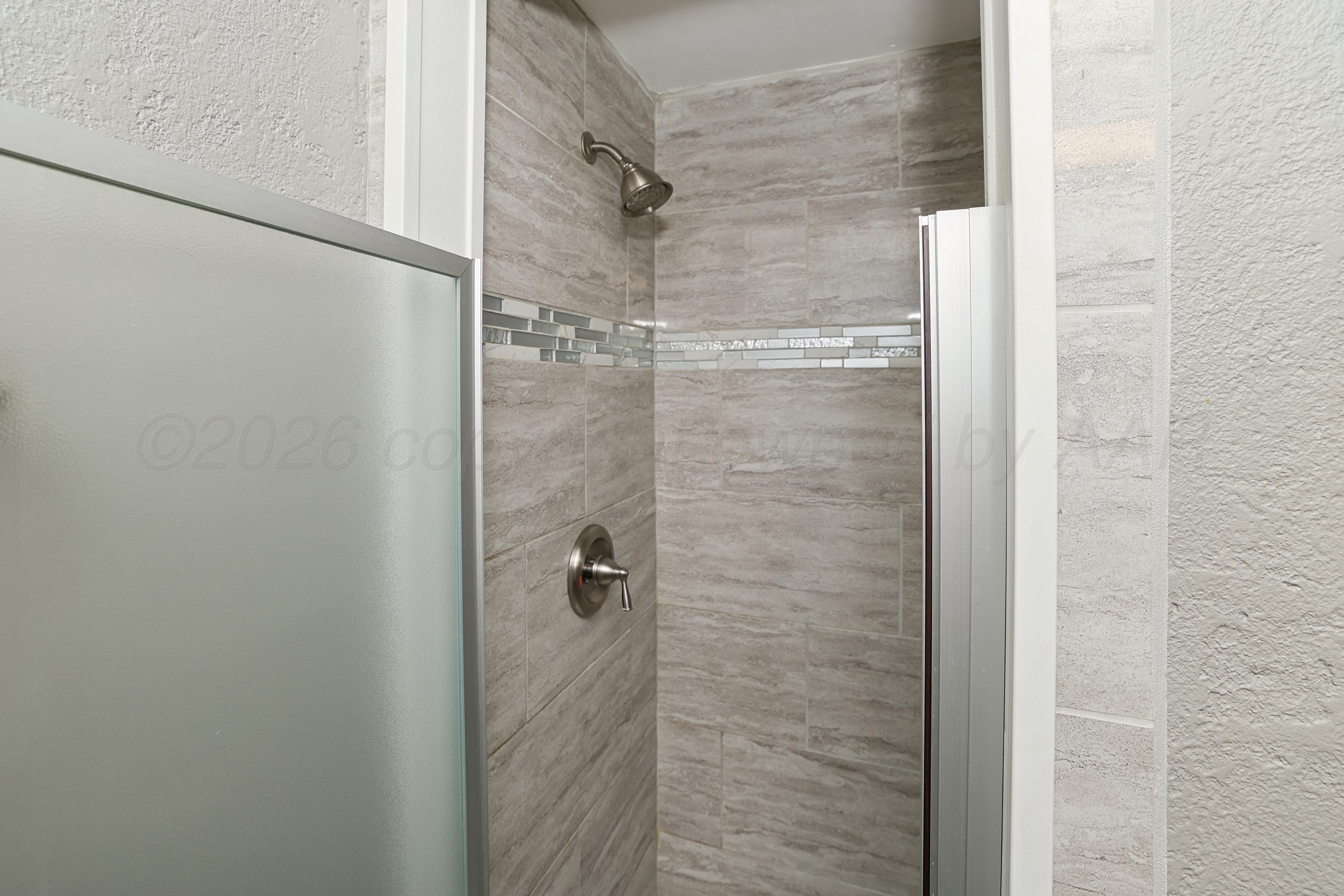 5316 Capulin Lane Amarillo, TX 79110 - Photo 14 of 25 14-Primary Bath Shower