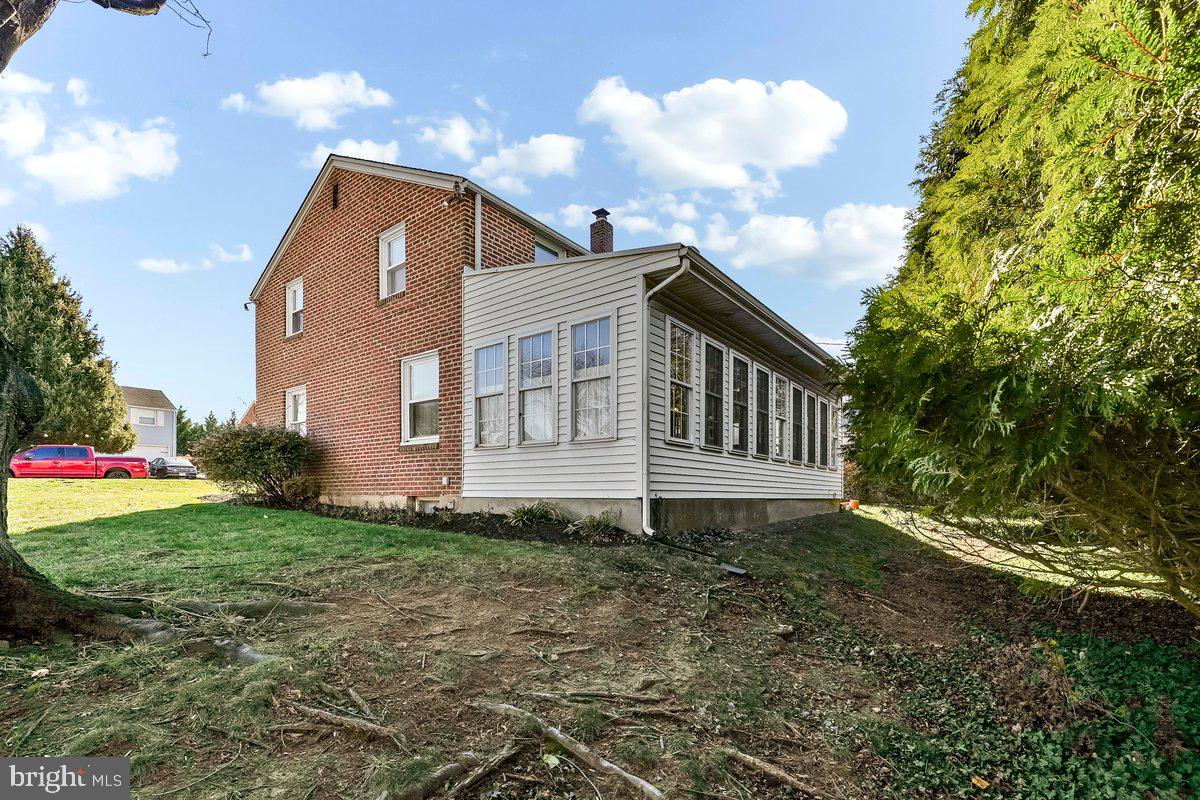 428 Wheatsheaf Road Springfield, PA 19064 - Photo 2 of 40 a view of a house with a yard