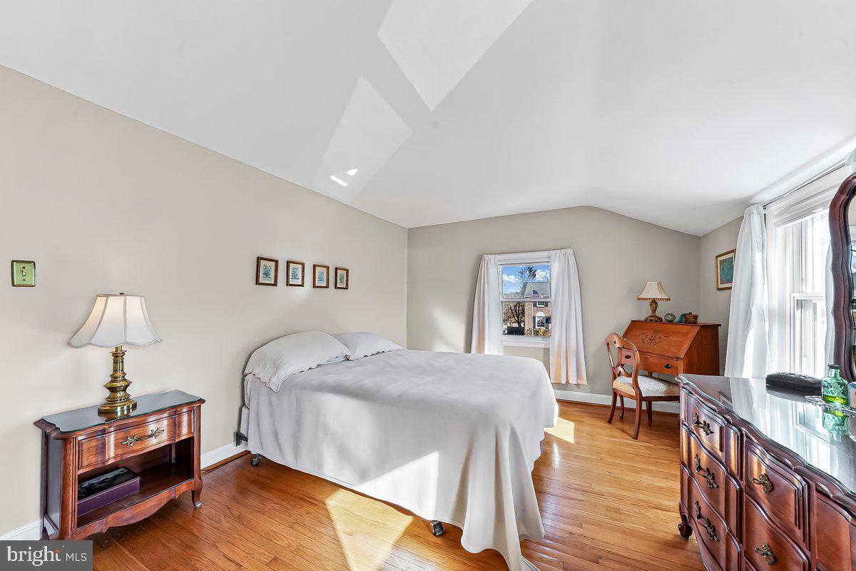 428 Wheatsheaf Road Springfield, PA 19064 - Photo 23 of 40 a bedroom with a bed and wooden floor