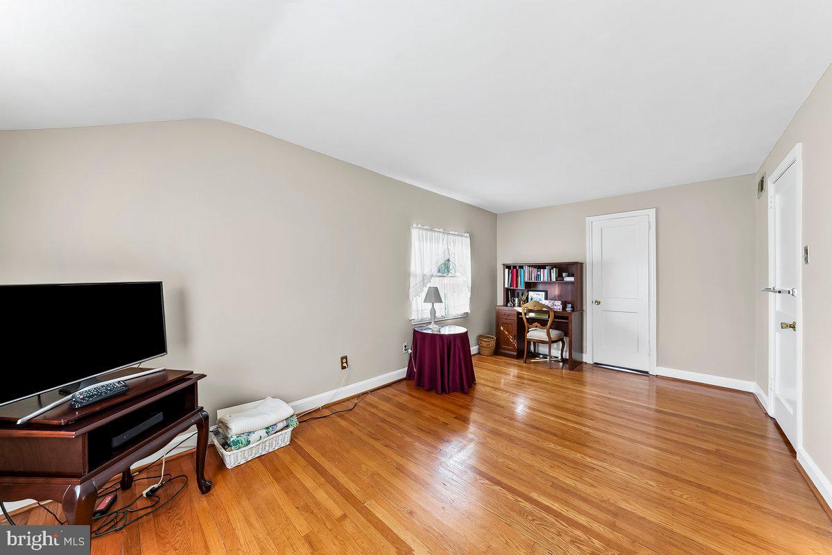 428 Wheatsheaf Road Springfield, PA 19064 - Photo 28 of 40 a view of a livingroom with furniture and a flat screen tv