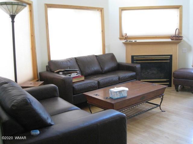 1922 Artist Draw Road Heber, AZ 85928 - Photo 11 of 63 a living room with furniture and a fireplace