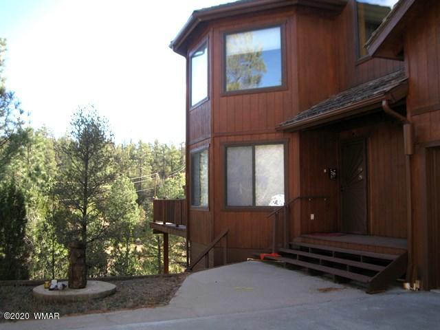 1922 Artist Draw Road Heber, AZ 85928 - Photo 2 of 63 a front view of a house with a yard