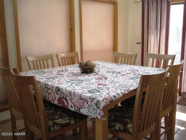 1922 Artist Draw Road Heber, AZ 85928 - Photo 23 of 63 a dining table with a window