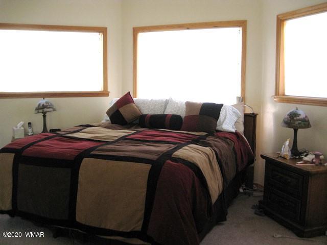 1922 Artist Draw Road Heber, AZ 85928 - Photo 31 of 63 a bedroom with bed and window