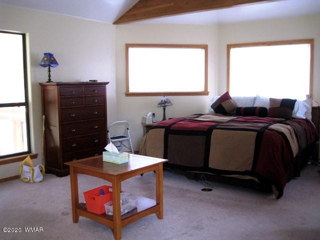 1922 Artist Draw Road Heber, AZ 85928 - Photo 32 of 63 a living room with a bed furniture and a window
