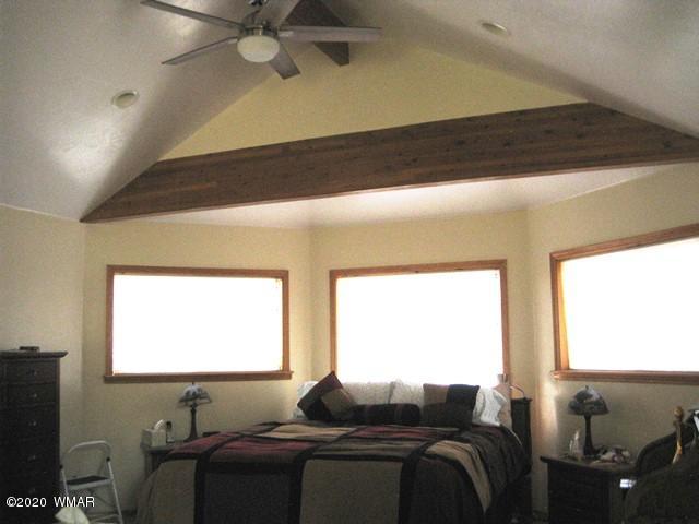 1922 Artist Draw Road Heber, AZ 85928 - Photo 33 of 63 a bedroom with a bed and a window